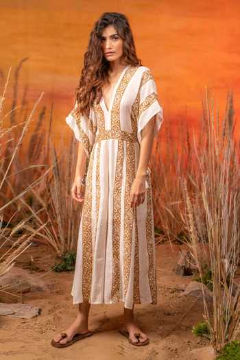 Buy Label Reyya Off White Rayon Lurex Printed And Embellished Floral Panel & Sequin Jumpsuit at Aza Fashions Buy_Label Reyya_Off White Rayon Lurex Printed And Embellished Floral Panel & Sequin Jumpsuit_at_Aza_Fashions