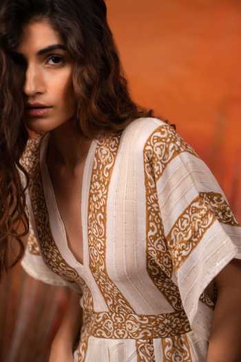 Buy Label Reyya Off White Rayon Lurex Printed And Embellished Floral Panel & Sequin Jumpsuit Online at Aza Fashions Buy_Label Reyya_Off White Rayon Lurex Printed And Embellished Floral Panel & Sequin Jumpsuit_Online_at_Aza_Fashions