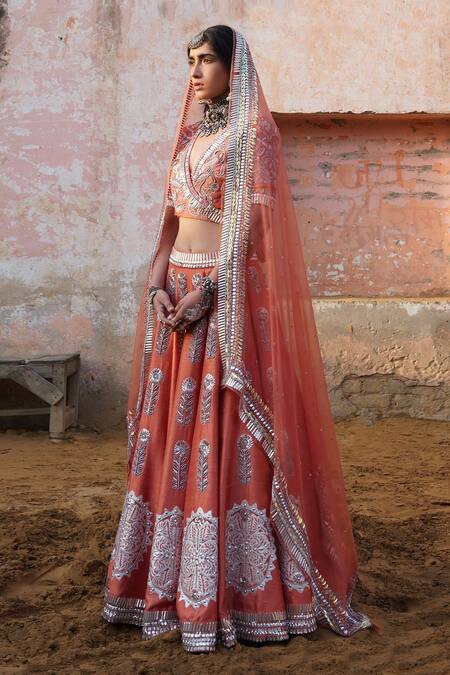 Saksham & Neharicka_Peach Raw , Organza V Neck Embroidered Bridal Lehenga Set _Online_at_Aza_Fashions