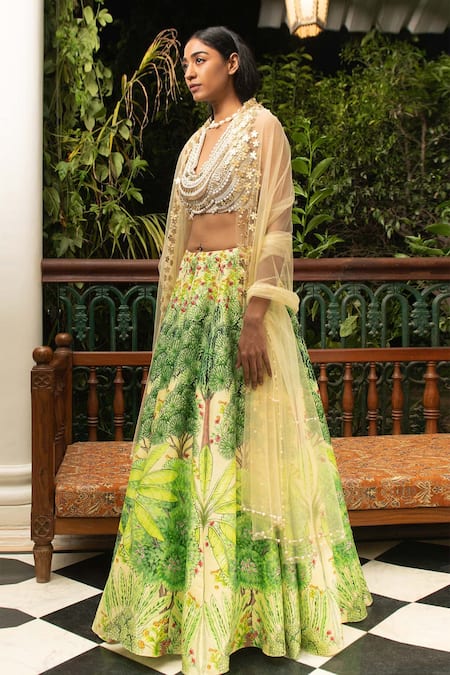Buy_Saksham & Neharicka_Yellow Chanderi And Net Floral Print, Bead, Pearl & Sequin V Neck Lehenga Set_Online_at_Aza_Fashions