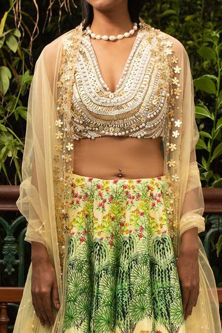 Saksham & Neharicka_Yellow Chanderi And Net Floral Print, Bead, Pearl & Sequin V Neck Lehenga Set_at_Aza_Fashions