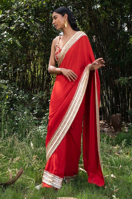 Saksham & Neharicka_Red Georgette Sequin Embroidered Saree With Unstitched Blouse Piece_Online_at_Aza_Fashions