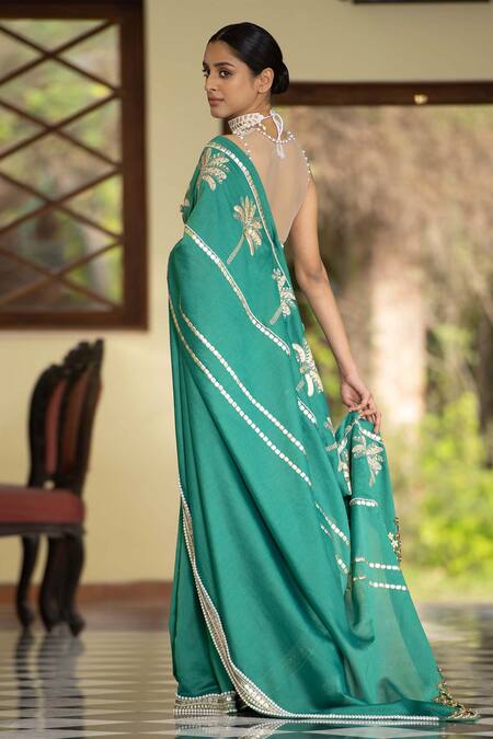 Shop Saksham & Neharicka Green Chanderi Pearl And Sequin Embroidered Saree With Unstitched Blouse Piece at Aza Fashions Shop_Saksham & Neharicka_Green Chanderi Pearl And Sequin Embroidered Saree With Unstitched Blouse Piece_at_Aza_Fashions