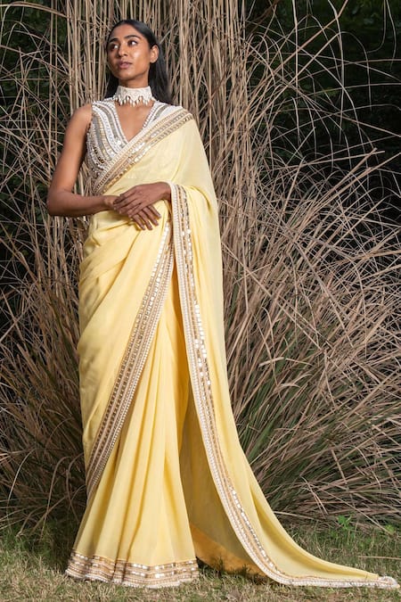 Saksham & Neharicka_Yellow Georgette Sequin And Pearl Embroidered Saree With Unstitched Blouse Piece_Online_at_Aza_Fashions