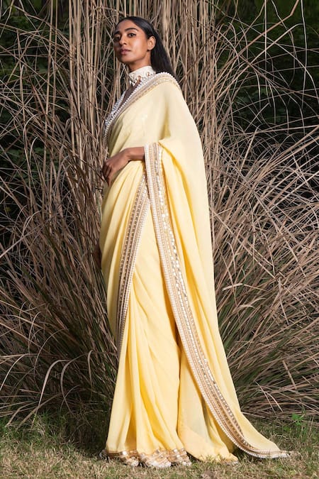 Buy_Saksham & Neharicka_Yellow Georgette Sequin And Pearl Embroidered Saree With Unstitched Blouse Piece_Online_at_Aza_Fashions