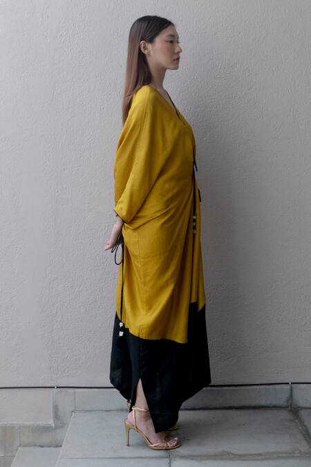 Kavya Singh Kundu Yellow Silk V-neck Freya Flared Kaftan at Aza Fashions Kavya Singh Kundu_Yellow Silk V-neck Freya Flared Kaftan _at_Aza_Fashions