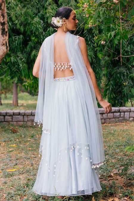 Shop Tarini Vij Blue Blouse Net Lining Satin Lehenga Double Layered Net Embroidered Set at Aza Fashions Shop_Tarini Vij_Blue Blouse Net Lining Satin Lehenga Double Layered Net Embroidered Set _at_Aza_Fashions