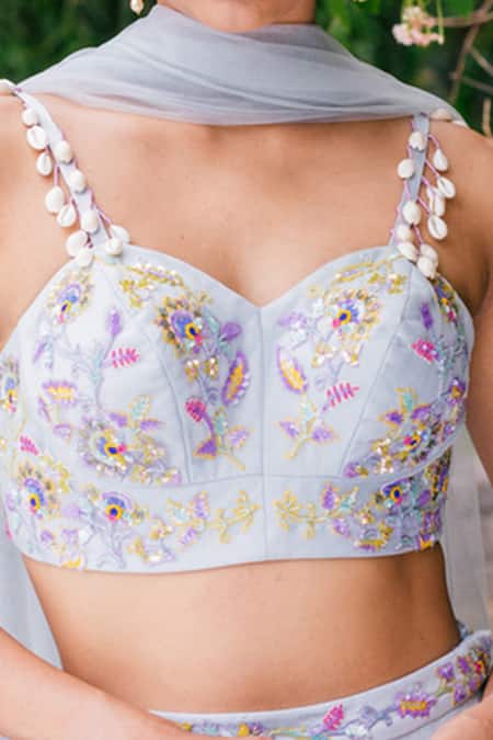 Shop Tarini Vij Blue Blouse Net Lining Satin Lehenga Double Layered Net Embroidered Set Online at Aza Fashions Shop_Tarini Vij_Blue Blouse Net Lining Satin Lehenga Double Layered Net Embroidered Set _Online_at_Aza_Fashions