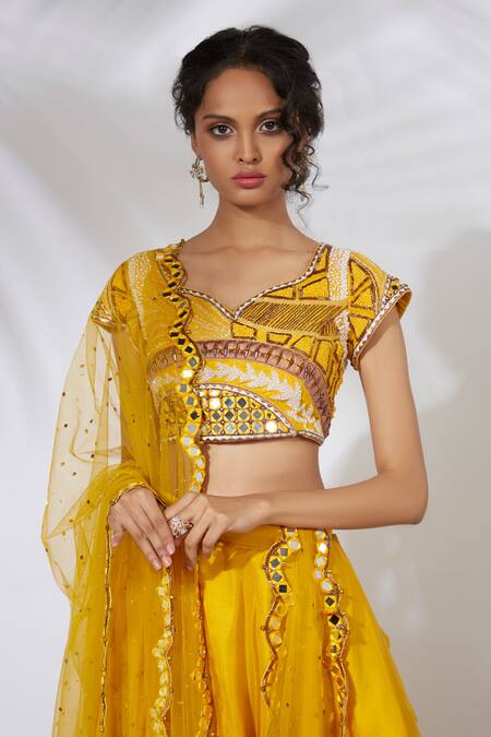 Mehak Murpana_Yellow Net, Crepe Leaf Neck Layered Lehenga Set_Online_at_Aza_Fashions