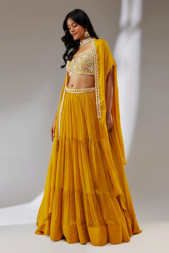 Neha Khullar Tiered Chiffon Lehenga Cape Set
