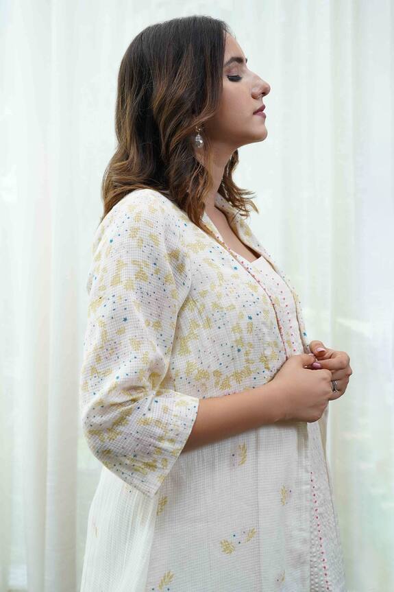 Tussah by Siddhi Shah White Textured Cotton Floral Print Shrug With Dress 4