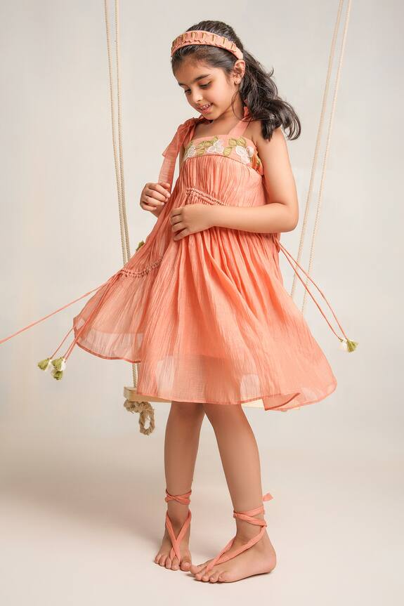 Buy_The Right Cut_Peach Tie-up Dress For Girls_Online_at_Aza_Fashions