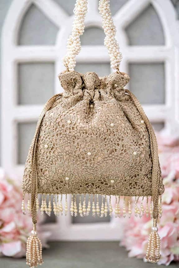 Buy Amyra Cutwork Potli Bag Online | Aza Fashions