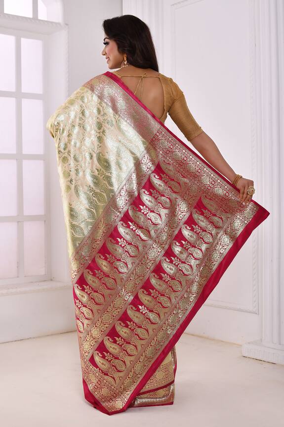 Shop_Nazaakat by Samara Singh_Cream Silk Banarasi Floral And Paisley Woven Saree_at_Aza_Fashions