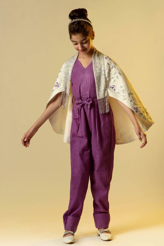 purple jumpsuit with cape