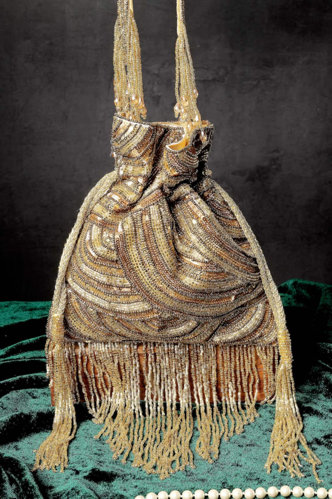 A Clutch Story Glittering Tassel Potli