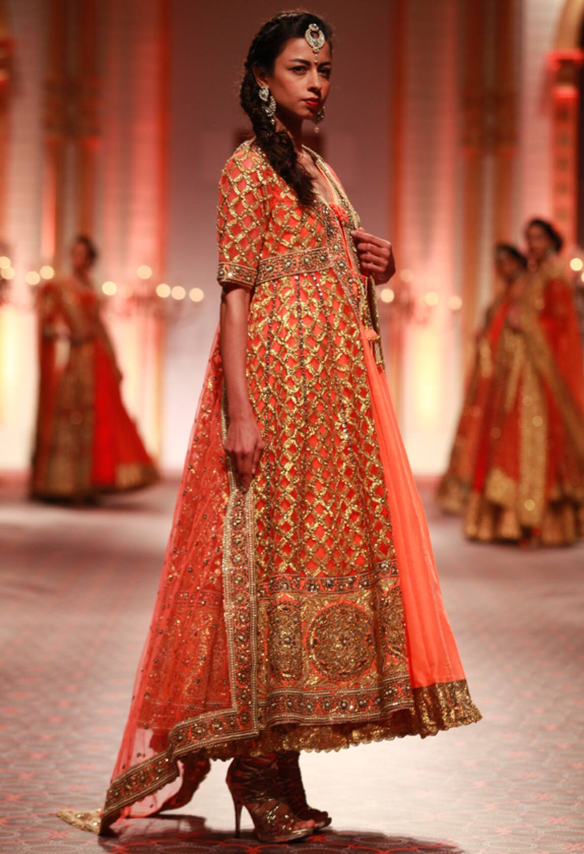 Preeti S Kapoor Orange anarkali set with gold embroidered jacket