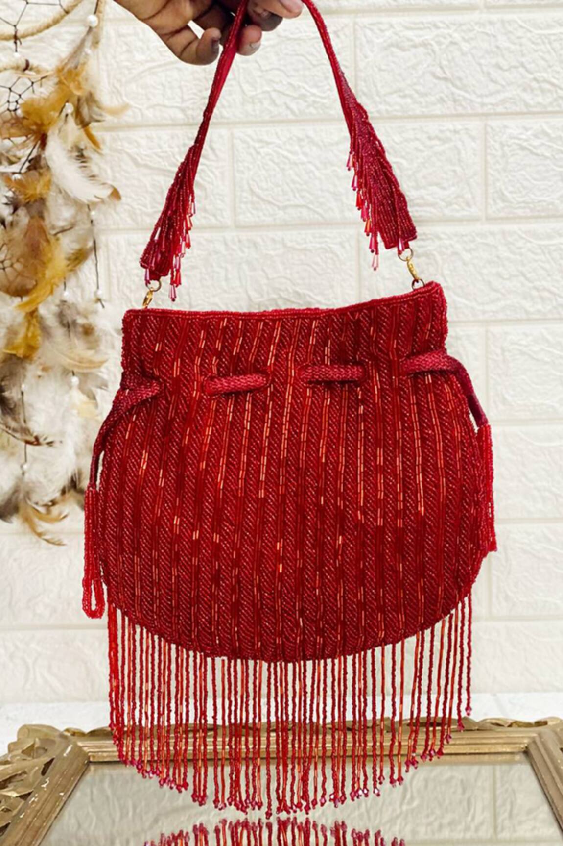 Kainiche By Mehak Tassel Fringe Border Potli