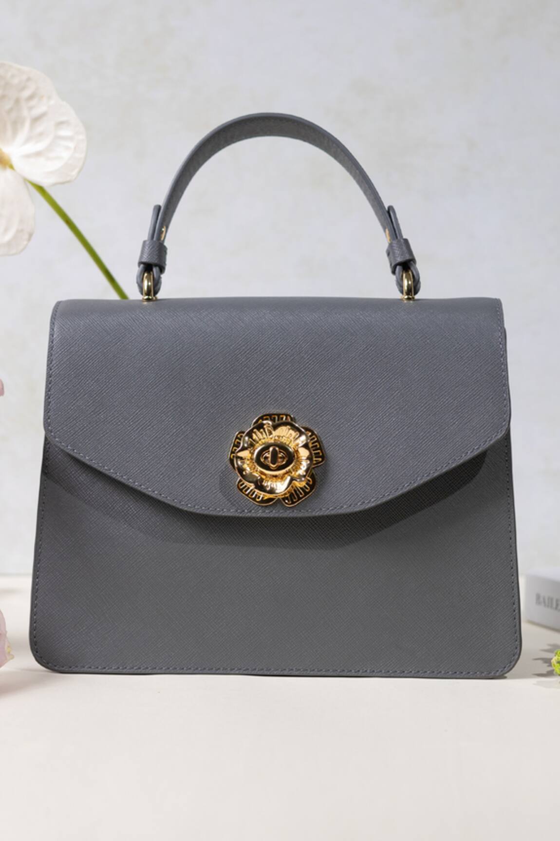 The Leather Garden Aster Flap Sling Bag