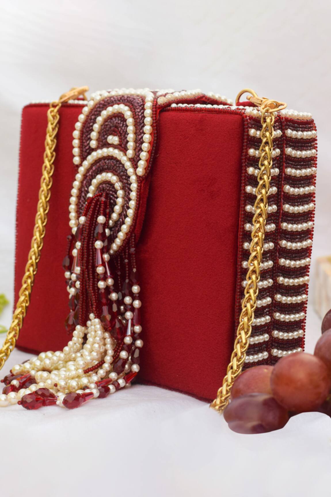 Eena Erisha Tassel Clutch with Sling