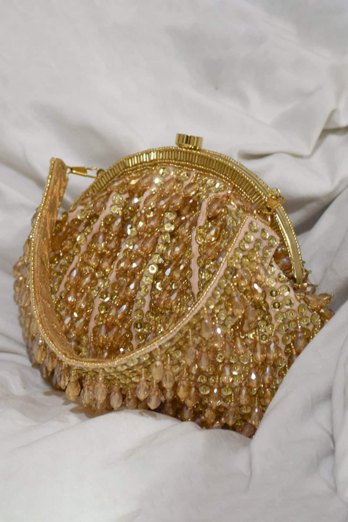Eena Paravi Bead Tassel Clutch  