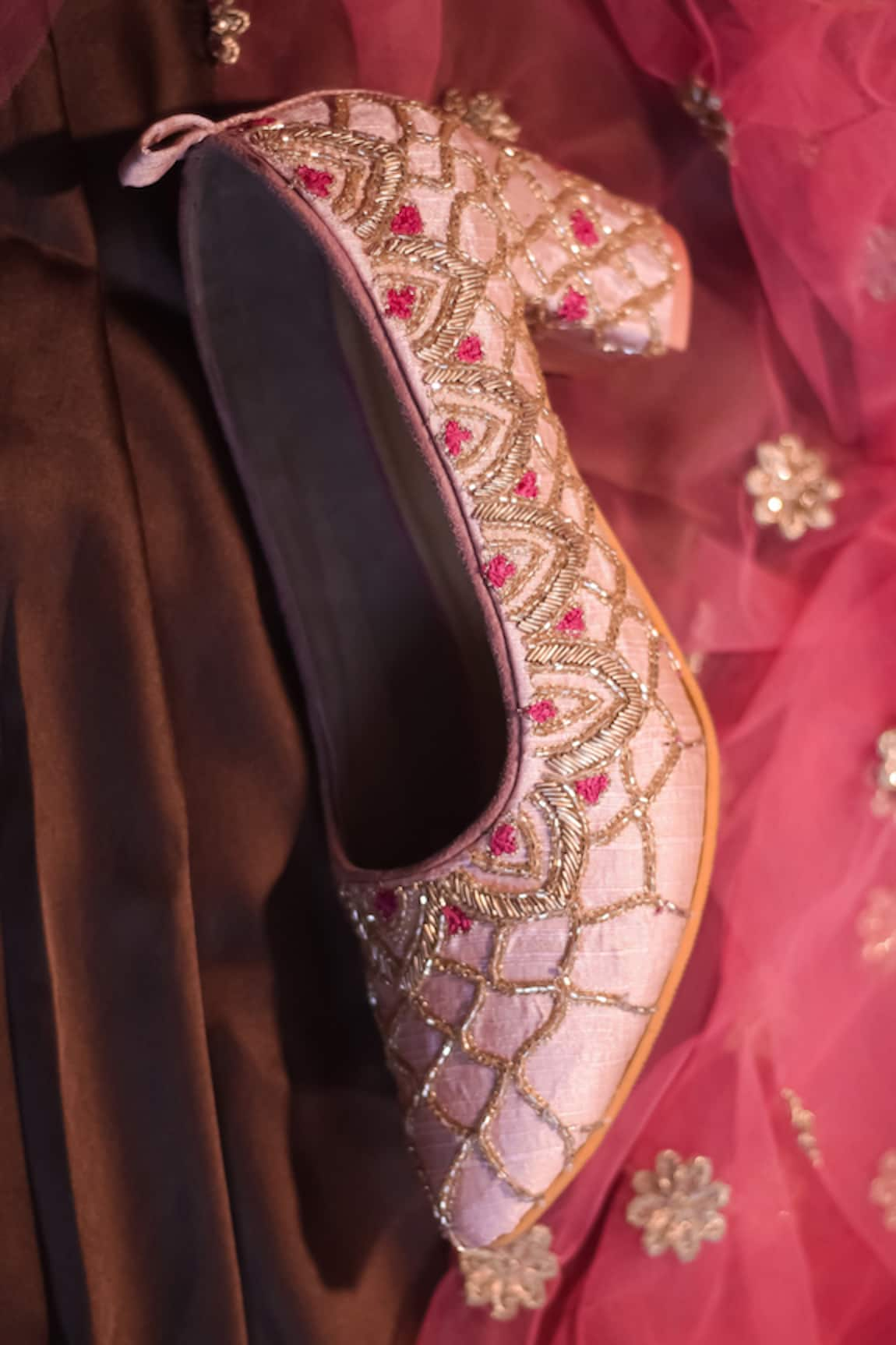 What should be the length of a flared lehenga with respect to the heels of  footwear? Do the heels need to be covered under lehenga or should they be  revealed? - Quora