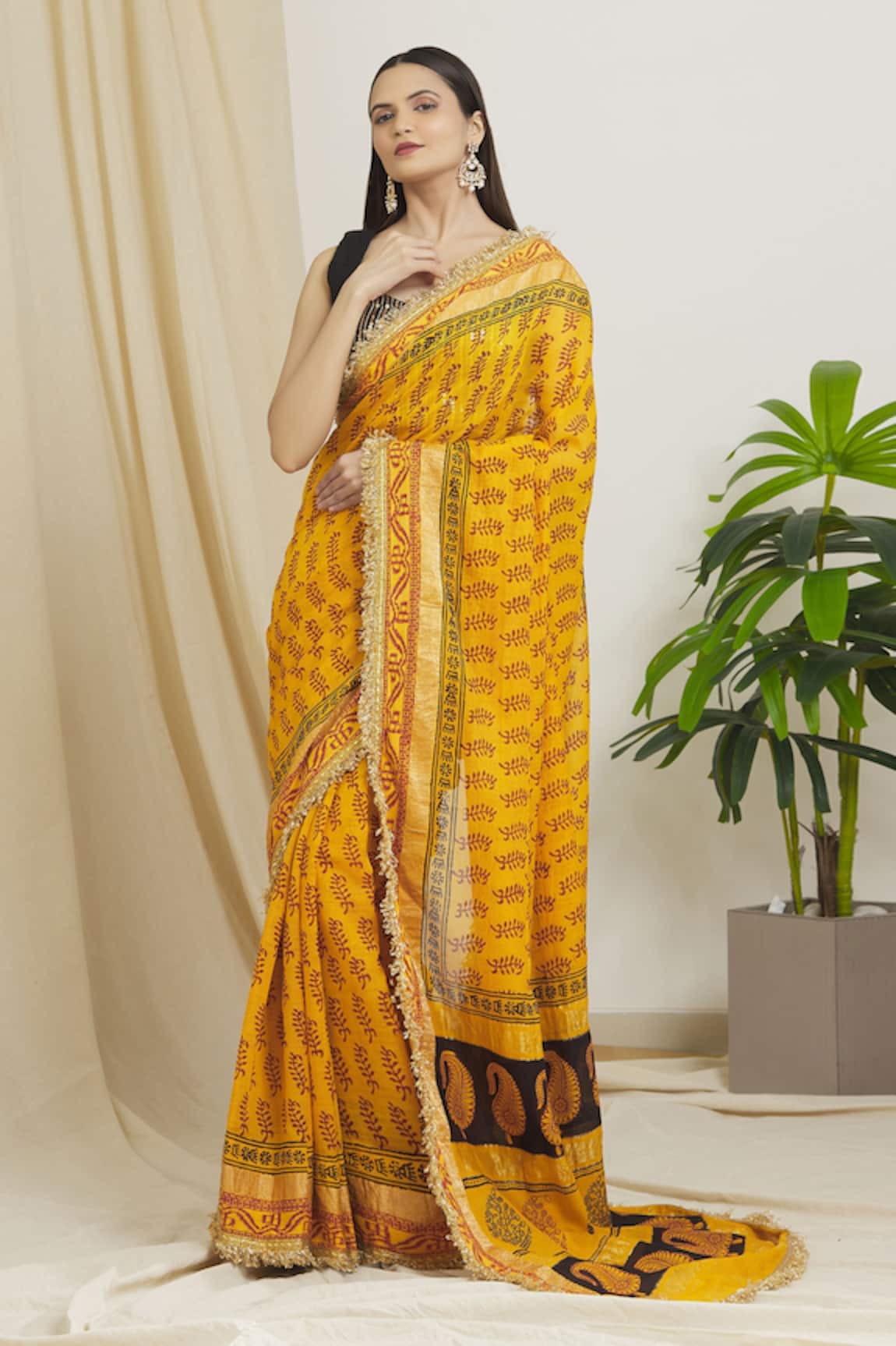 Surendri Woven Saree With Embroidered Blouse