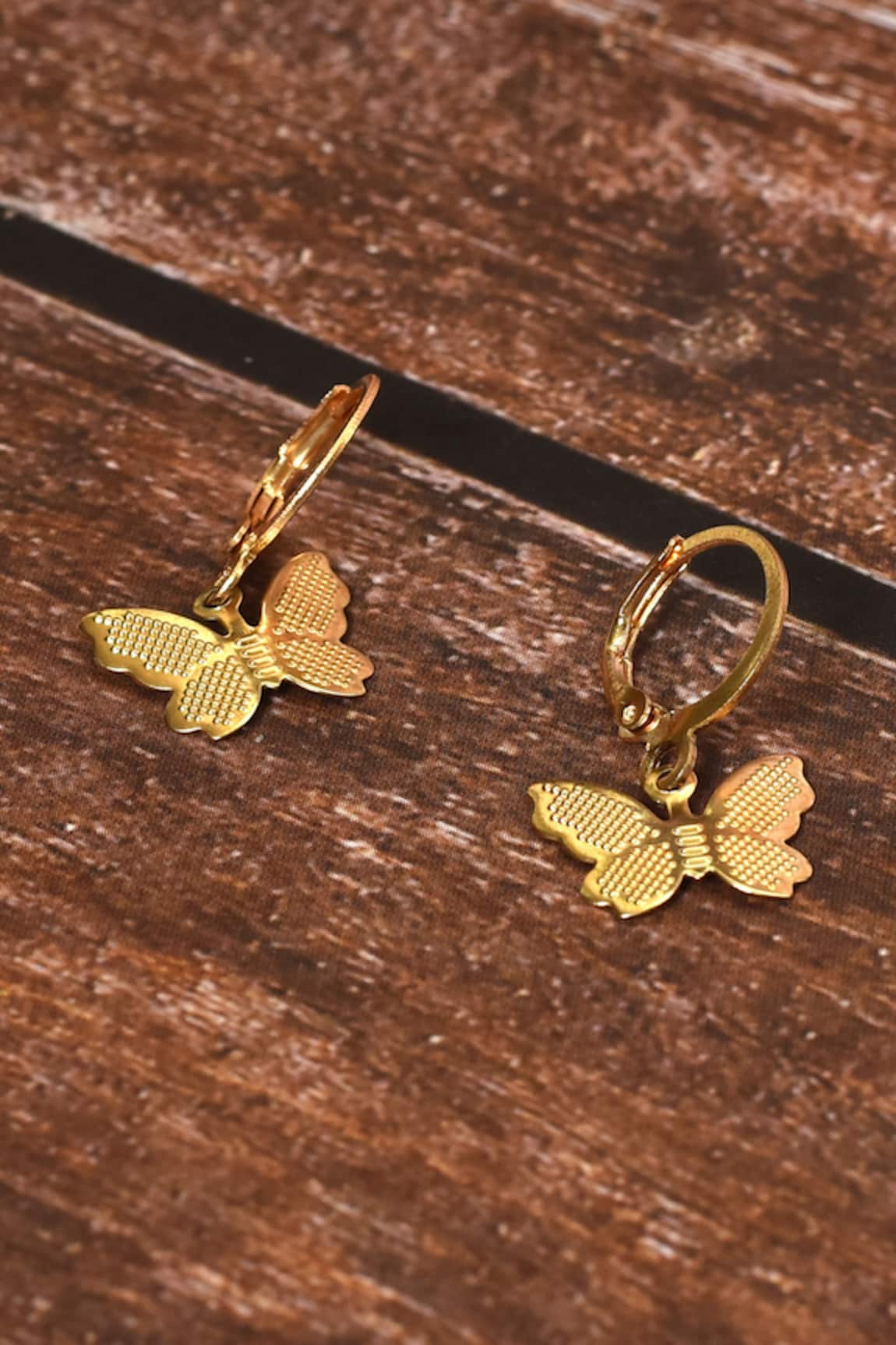 Sparkly butterfly earrings  GoldcolouredButterfly  Ladies  HM IN