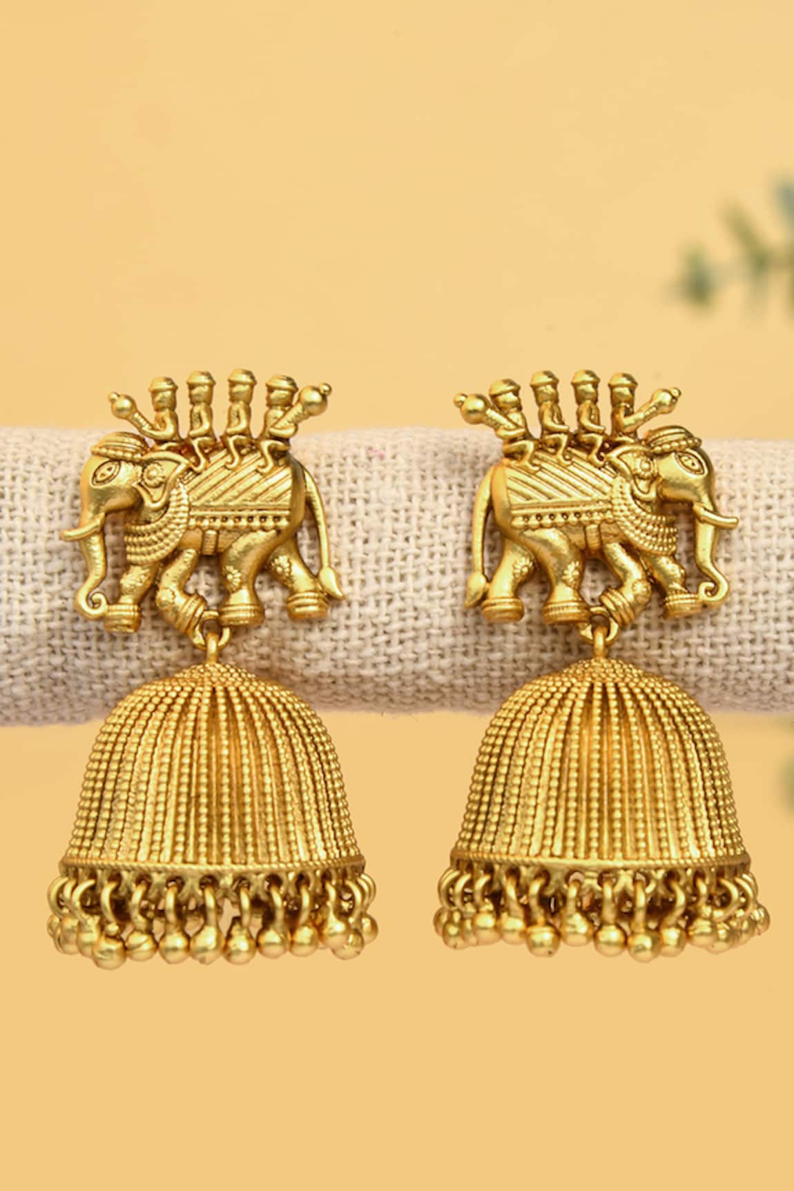 Ahaanya Howdah Carved Work Jhumka Earrings