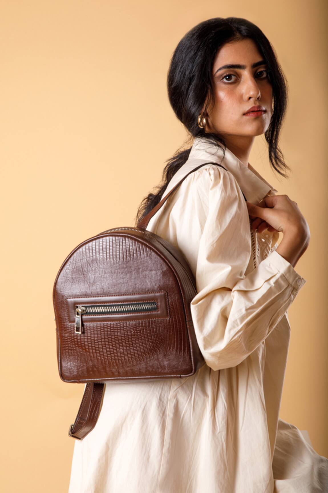 X Feet Above Thread Embroidered Brown Leather Backpack