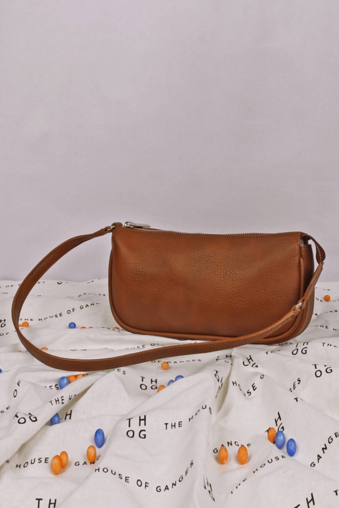 The House of Ganges Daily Plain Curved Shape Sling Bag