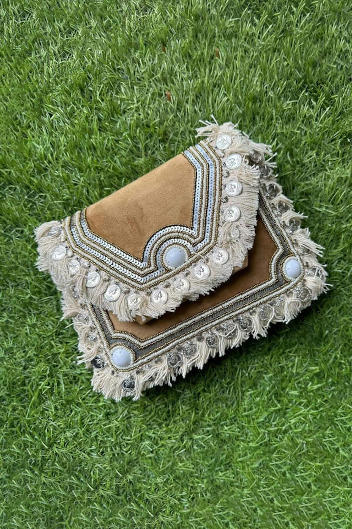 Stitched soles Boho Love Coin Embellished Clutch