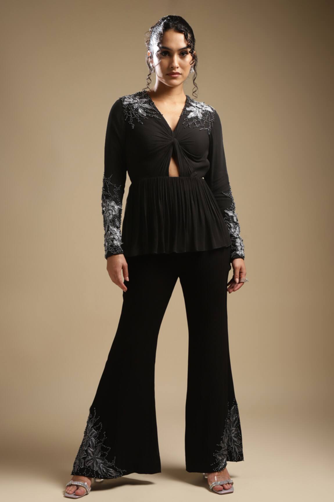 Sakshi Khetterpal Embroidered Peplum Top & Bell Bottom Pant Set