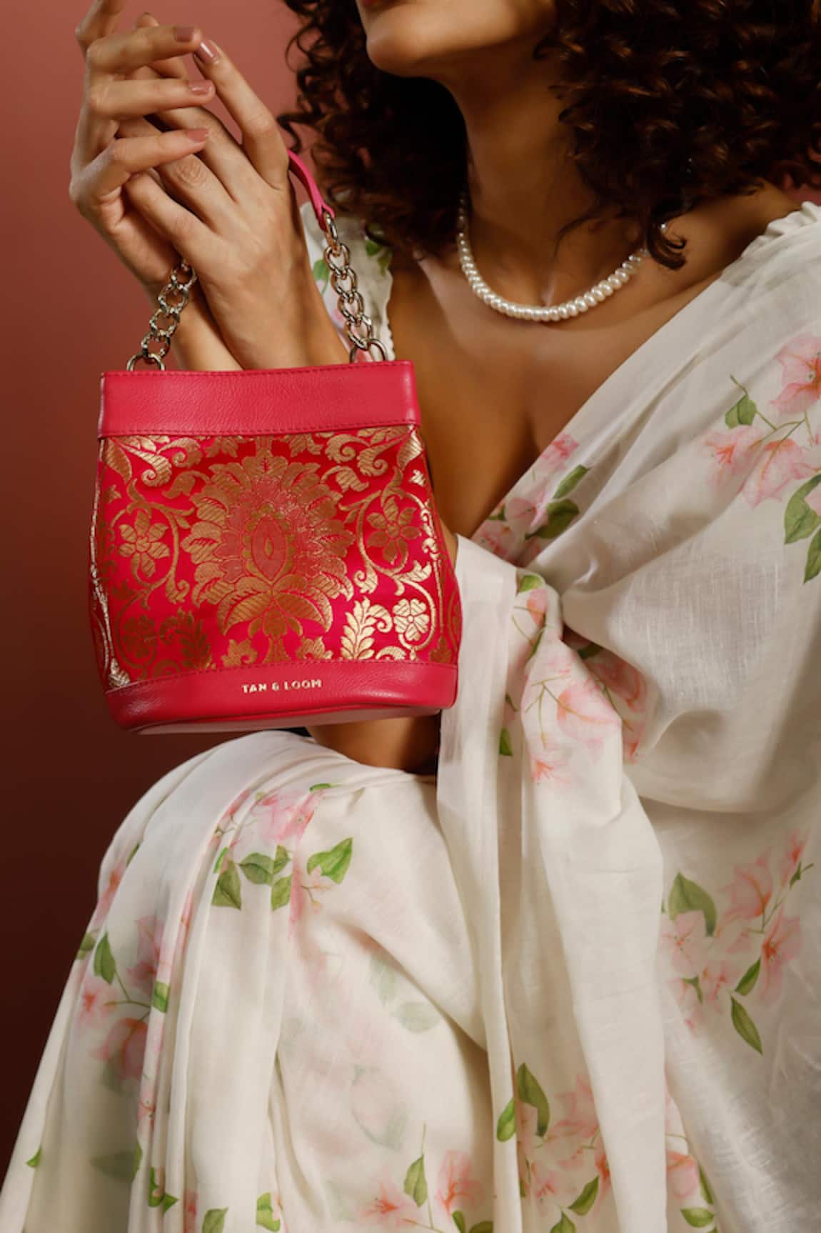 Tan & Loom Rani Floral Woven Pattern Potli Bag