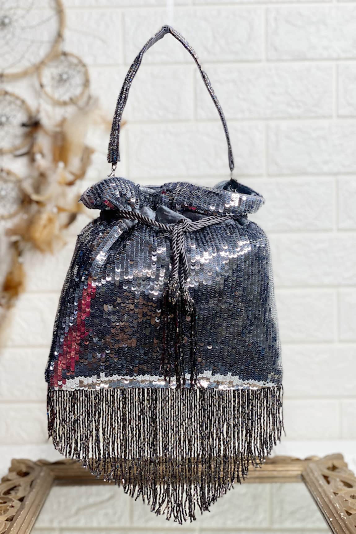 Kainiche by Mehak Sequin Embellished Tasselled Potli Bag