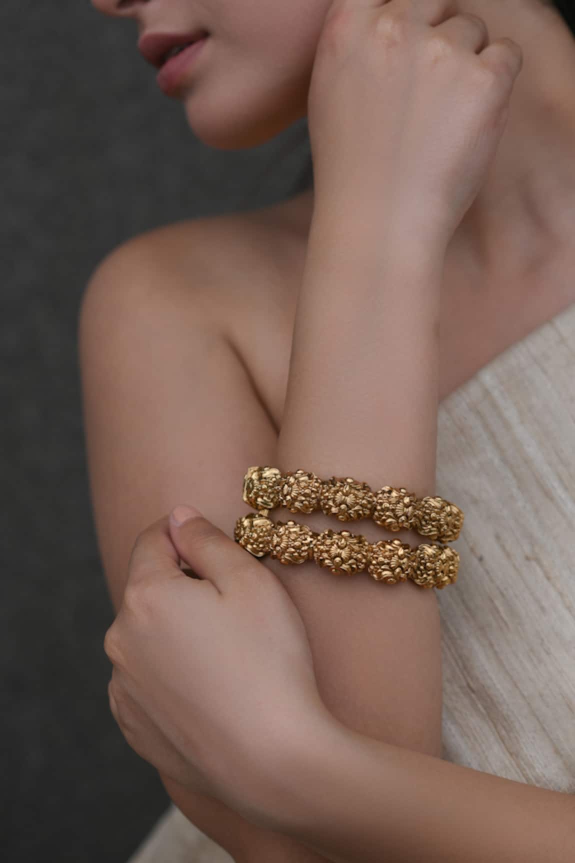 Do Taara Gold Embossed Temple Bangles Set 