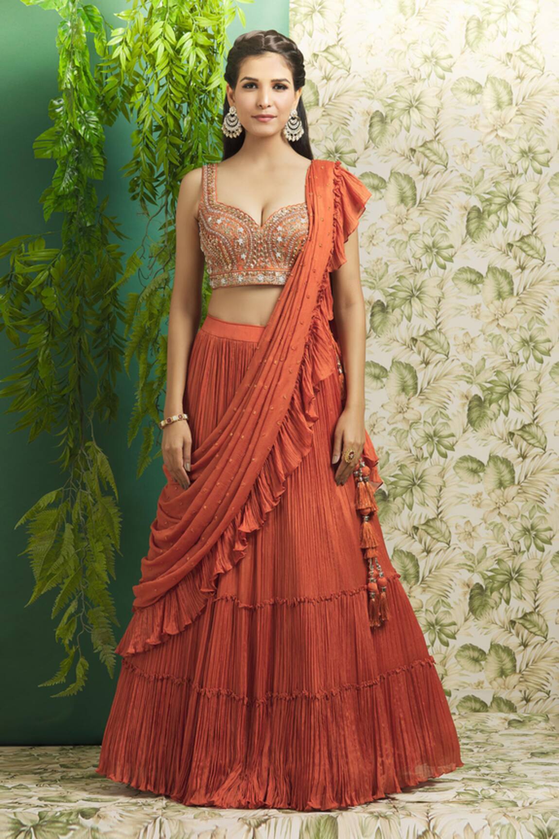 Anasuya Bharadwaj in a simple orange lehenga!