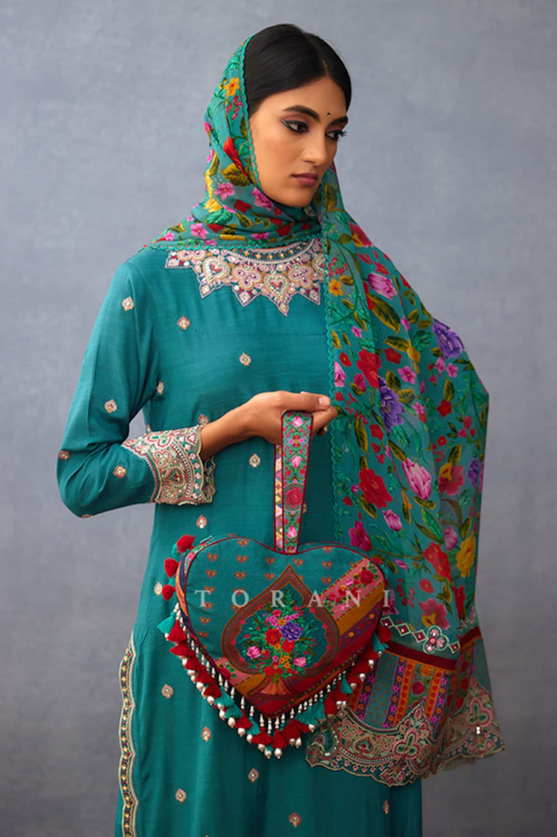 Torani Dil Nawaz Ruhi Print Potli Bag 