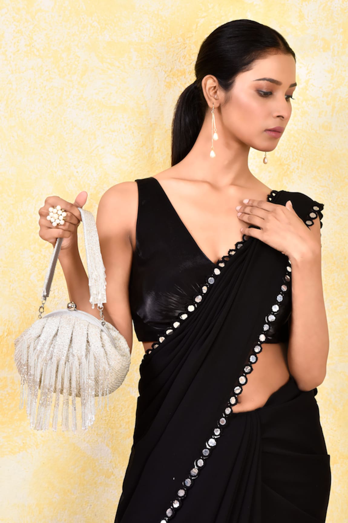 Kreivo by Vamanshi Damania Tasseled Potli Bag