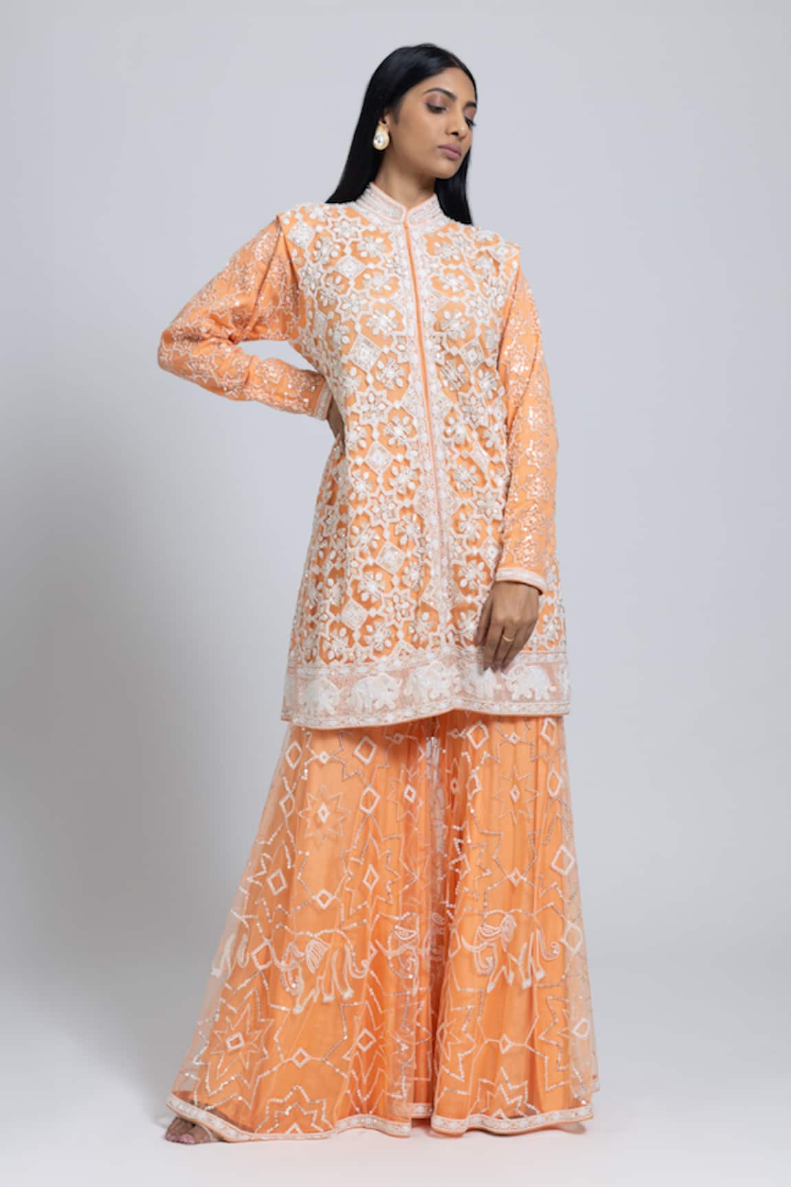 NIMA FASHIONS Hand Embroidered Kurta & Sharara Set