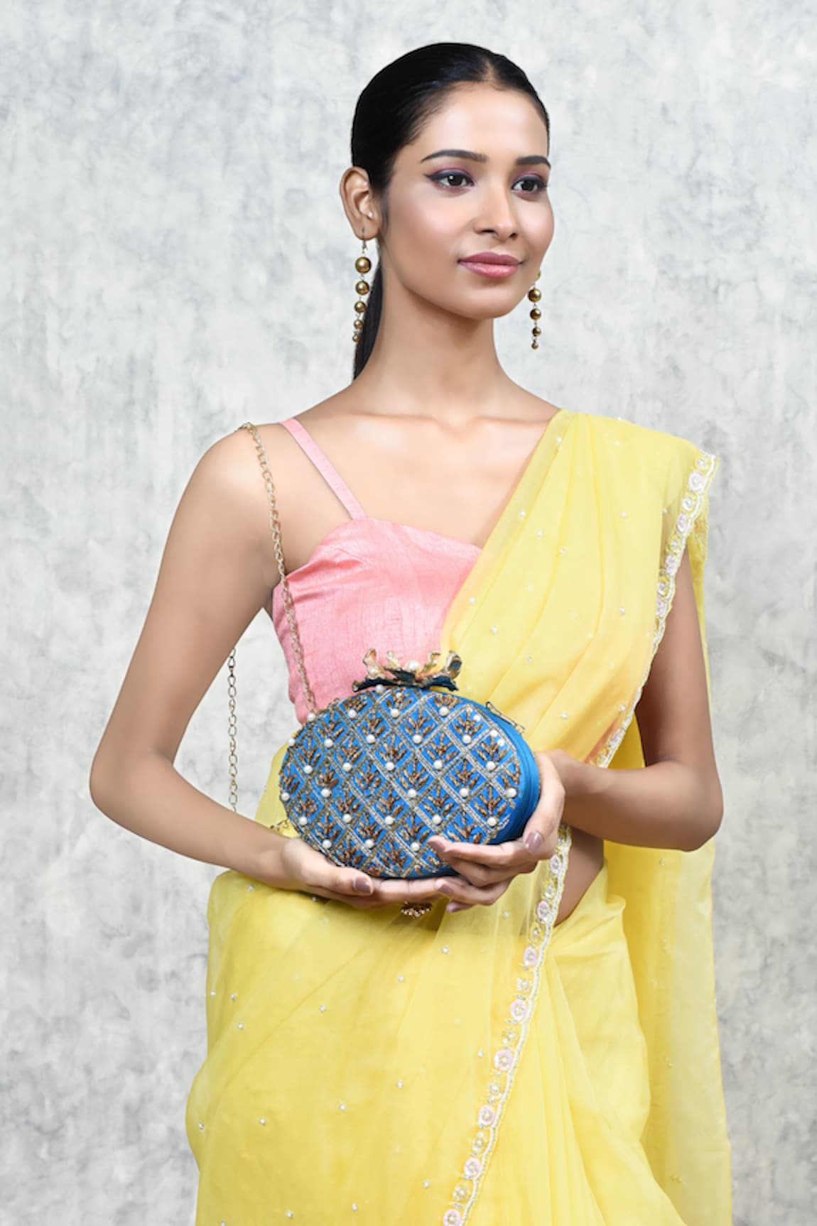 THE TAN CLAN Zafraan Oval Shaped Embroidered Clutch