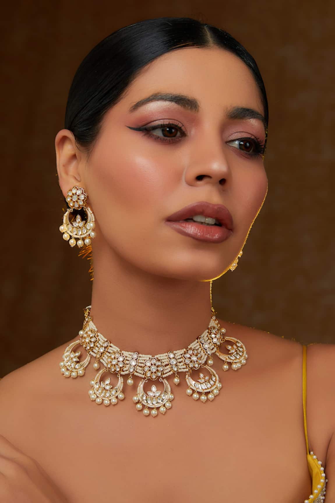 Zevar by Geeta Chaand Noor Kundan & Pearl Embellished Jewellery Set