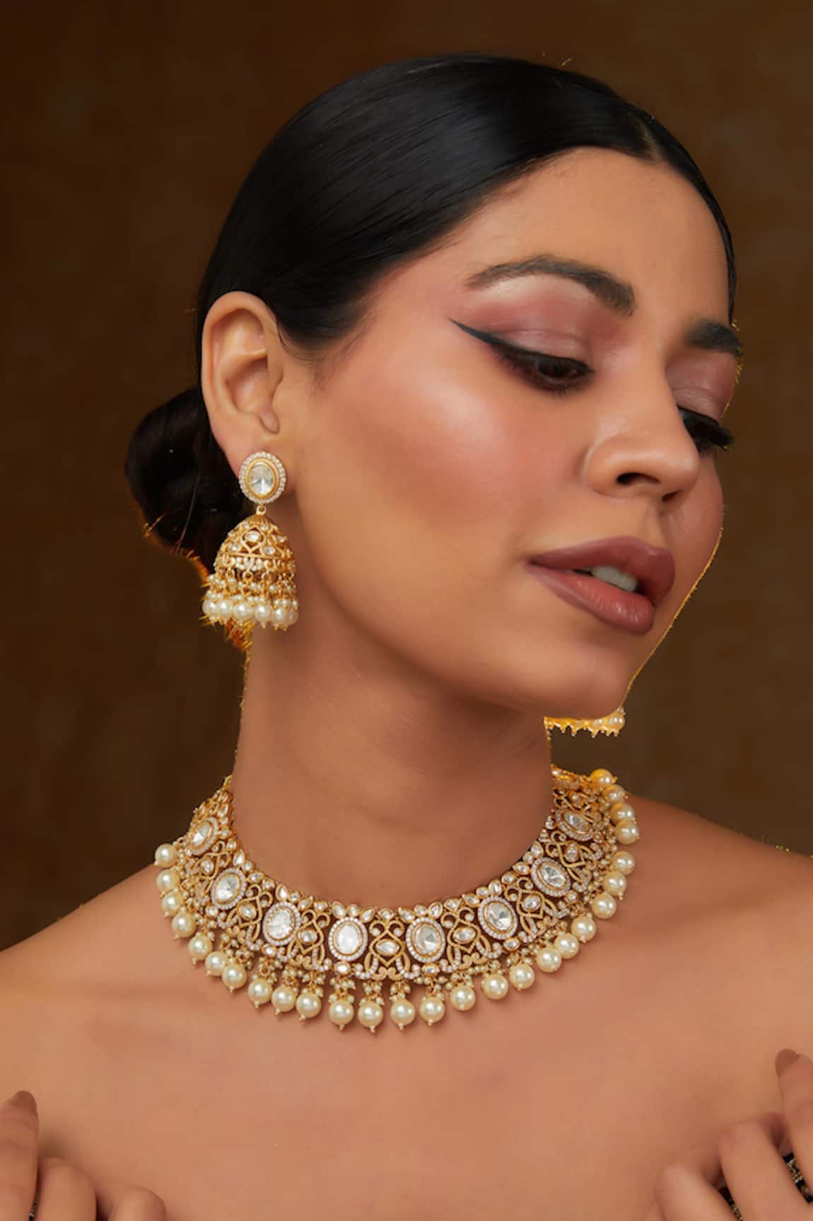 Zevar by Geeta Amaryllis Kundan Pearl Embellished Jewellery Set