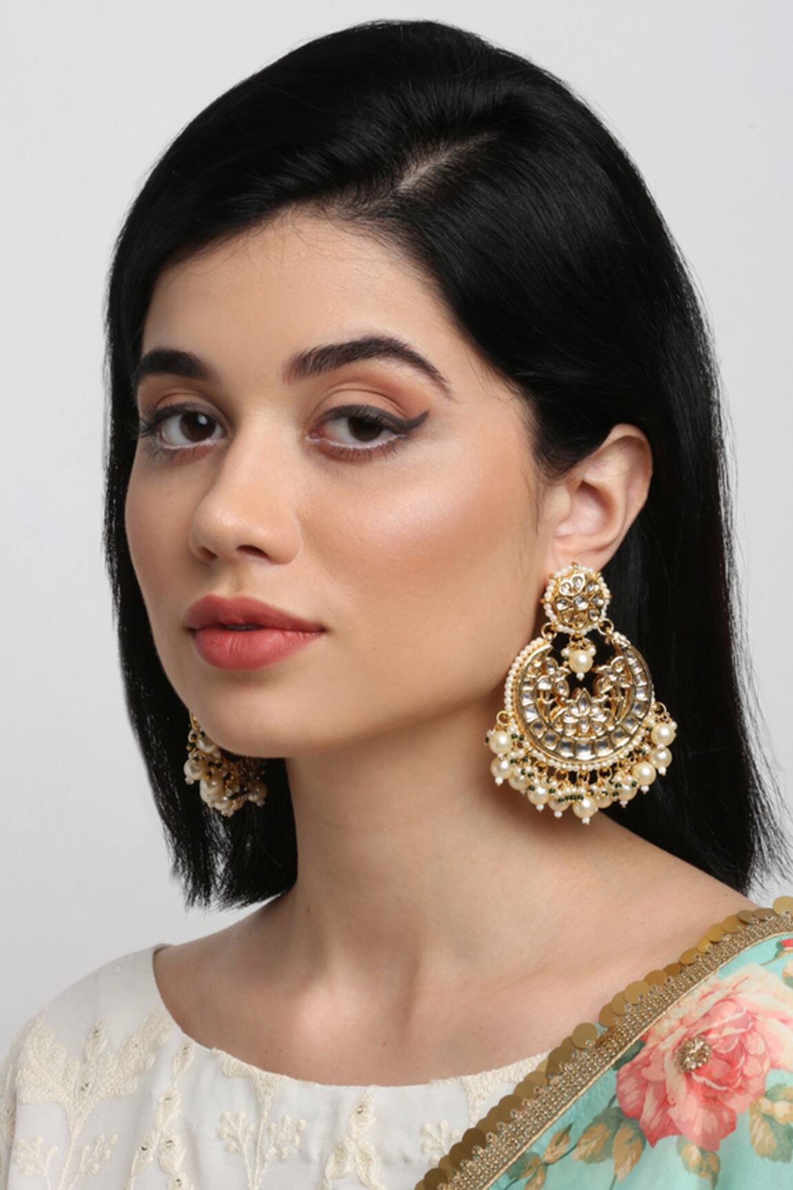 Ruby Raang Kundan Embellished Earrings