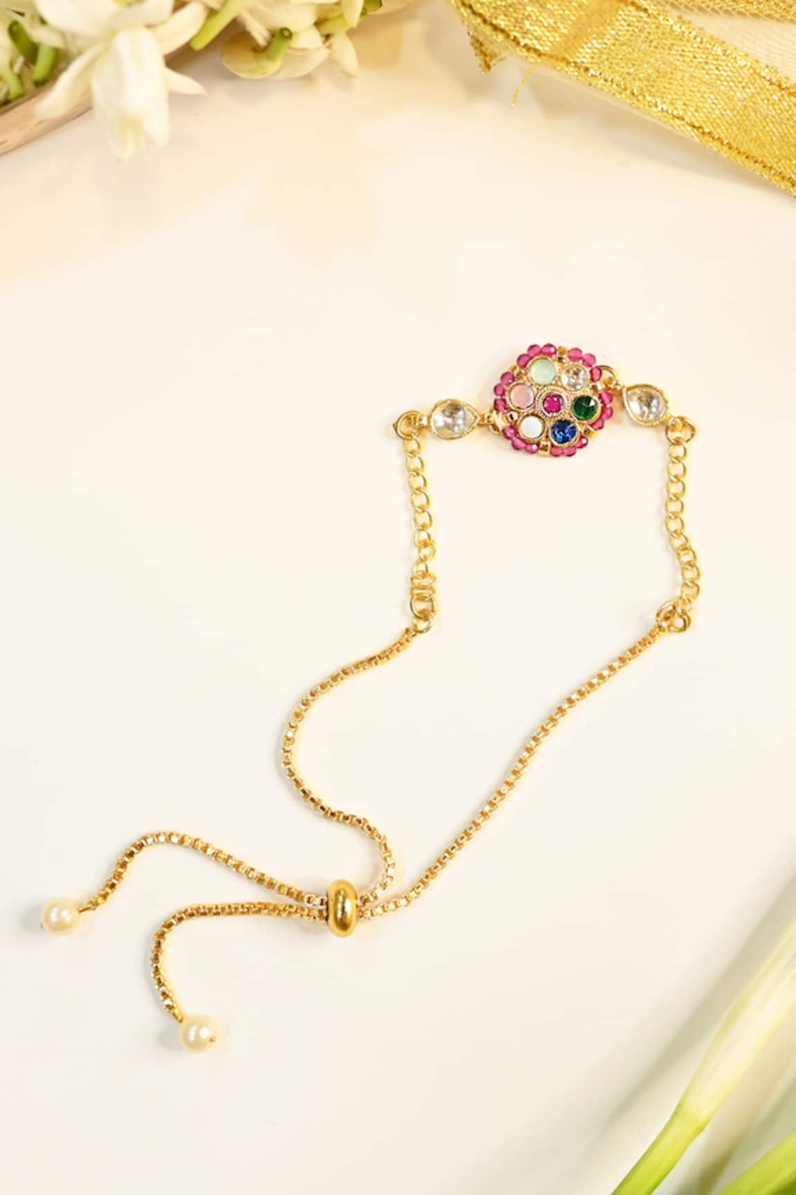 Shlok Jewels Kundan Gemstone Floral Rakhi 
