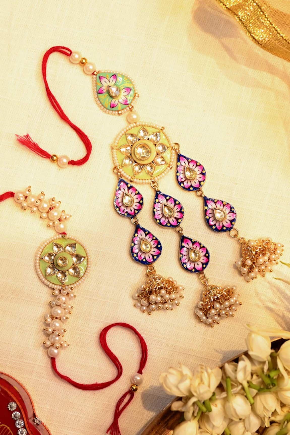 Shlok Jewels Kundan Lumba & Rakhi Set 