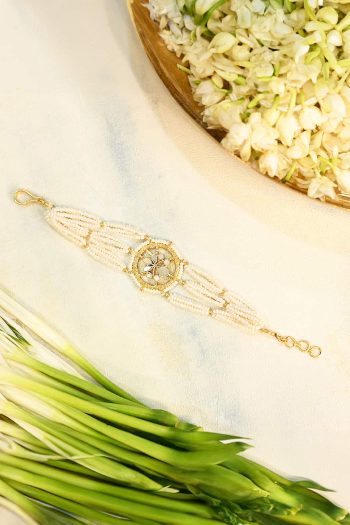 Shlok Jewels Gold Plated Mother of Pearls Rakhi 