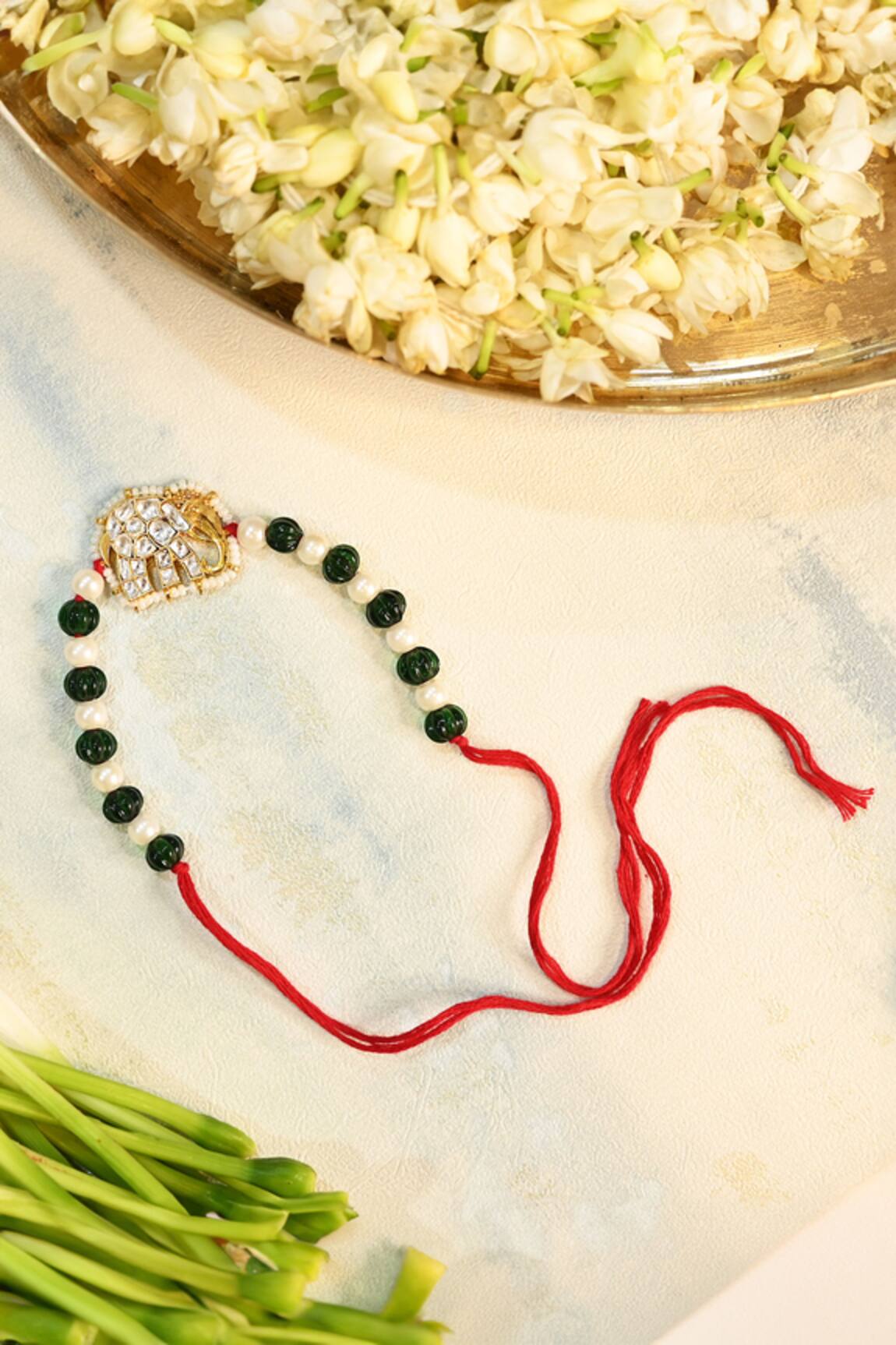 Shlok Jewels Kundan Embellished Rakhi 