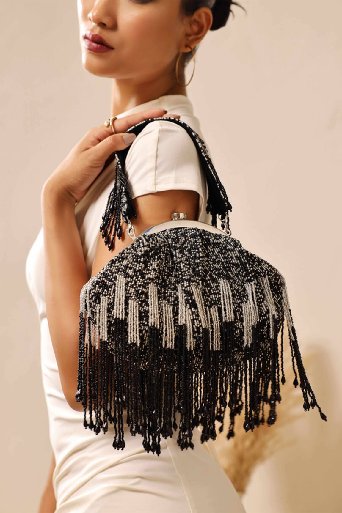 THE TAN CLAN Amour Tassel Embellished Batua 