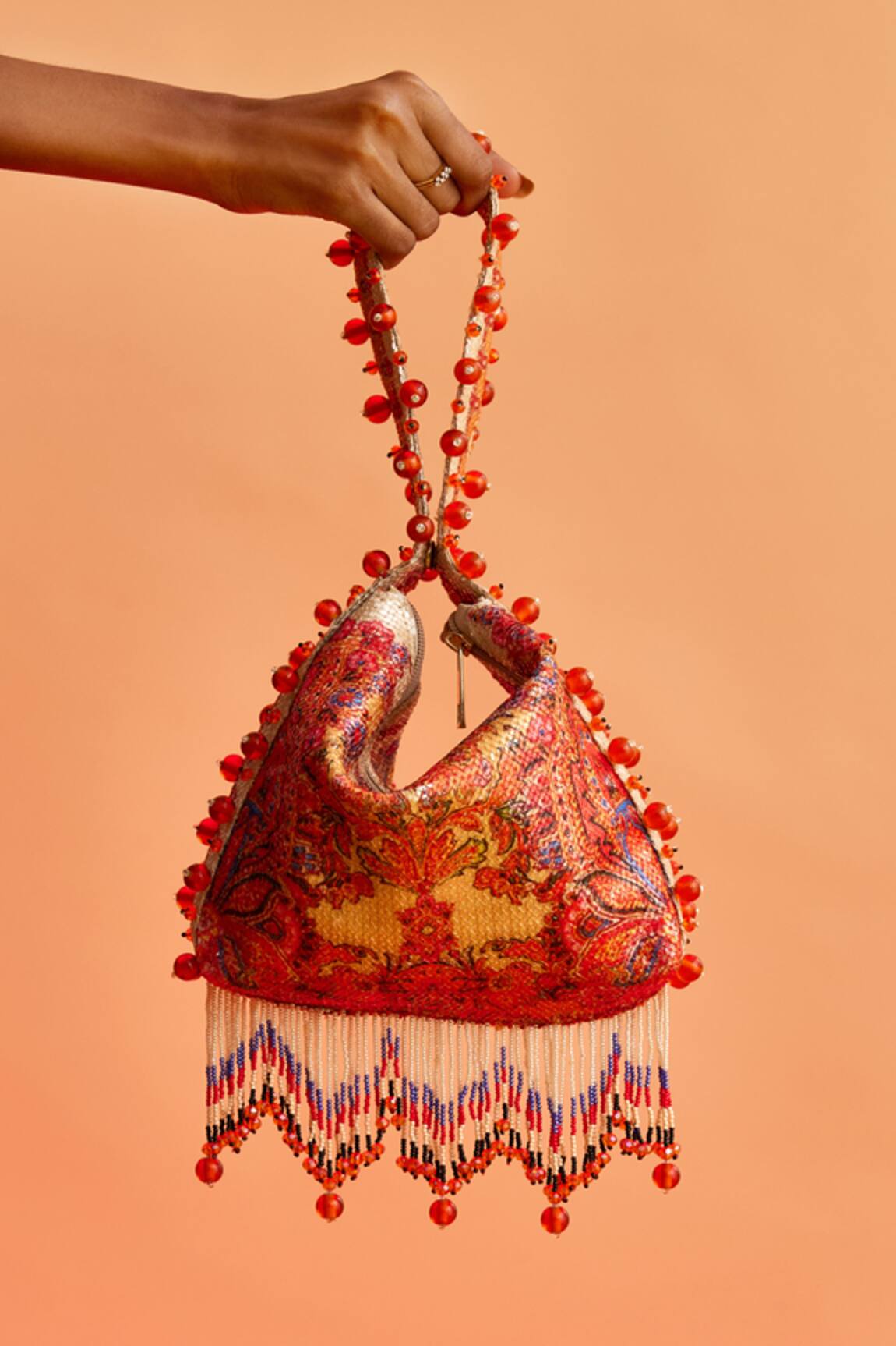 The Garnish Company Maya Floral Swirl Print Tassel Potli